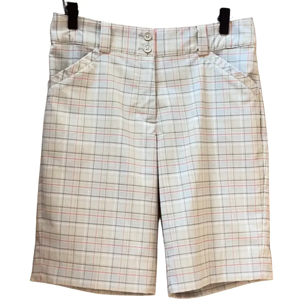 Nike Dri-Fit plaid gold shorts. Women’s size 4